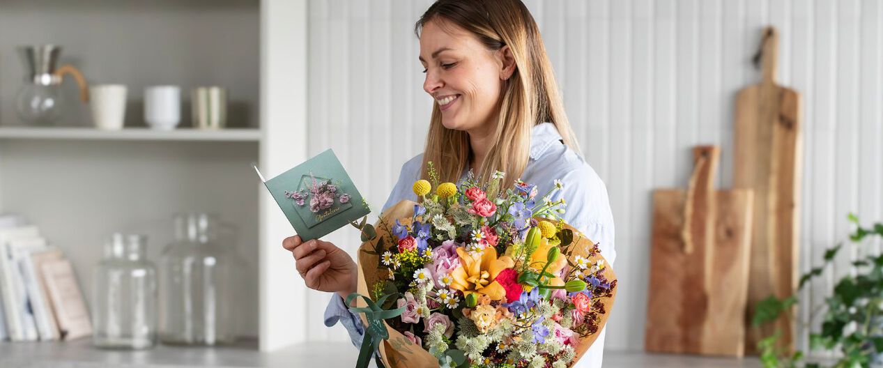 si takk med blomster